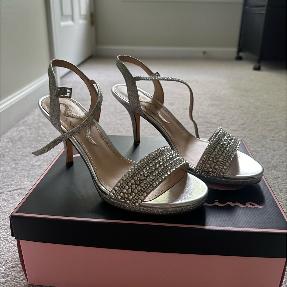 Women’s silver glitter 2 inch heels.